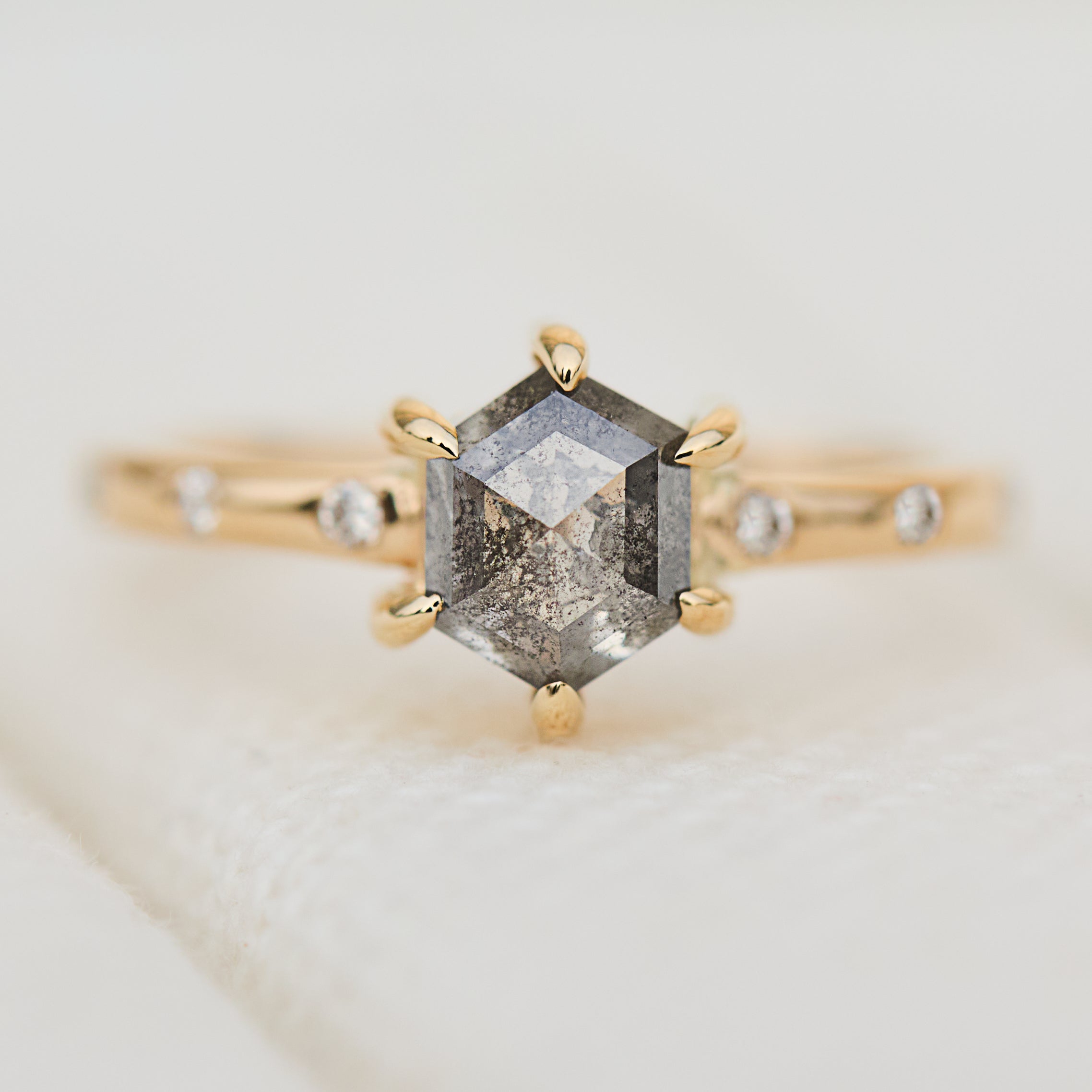 hexagon salt and pepper six claw diamond engagement ring in yellow gold