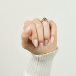 Platinum salt and pepper pear diamond engagement trilogy ring