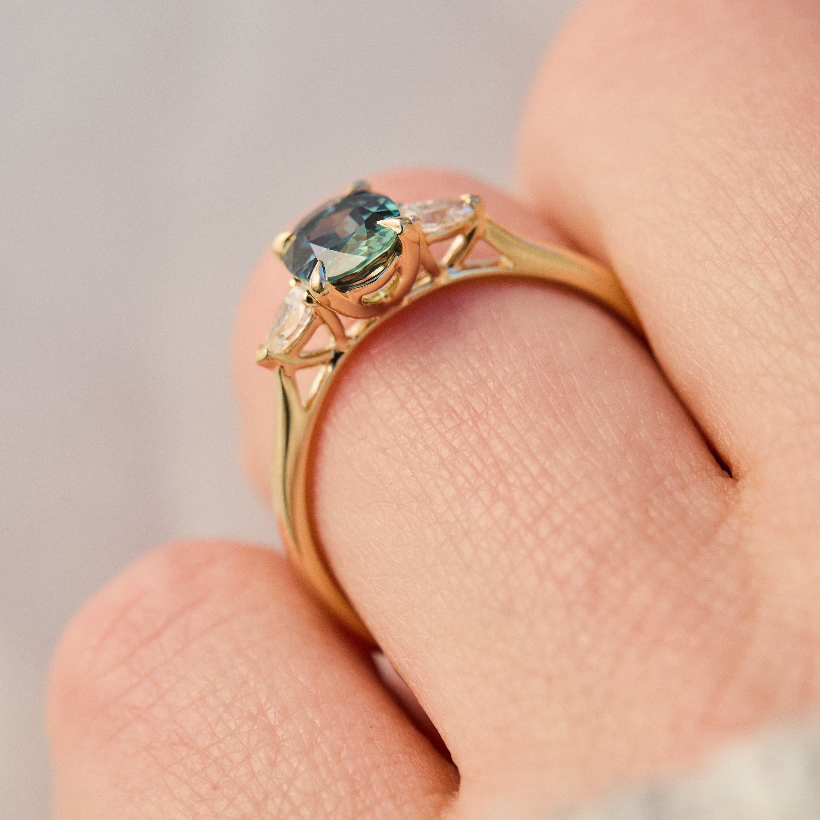 australian oval teal sapphire diamond yellow gold engagement ring