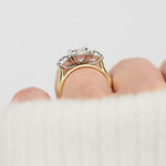 elongated cushion lab grown diamond trilogy engagement ring in yellow gold