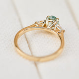 montana oval sapphire trilogy yellow gold engagement ring