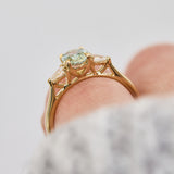 montana oval sapphire trilogy yellow gold engagement ring