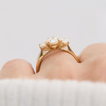 oval diamonds trilogy engagement ring set in 18ct yellow gold