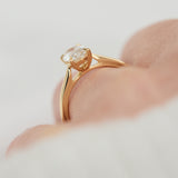 oval lab grown diamond engagement ring in yellow gold