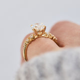 oval lab grown diamond yellow gold engagement cluster ring