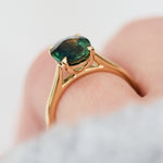 oval teal sapphire solitaire ring