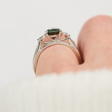 pear shape green teal sapphire trilogy engagement ring in platinum