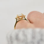 radiant cut lab grown diamond trilogy engagement ring in yellow gold