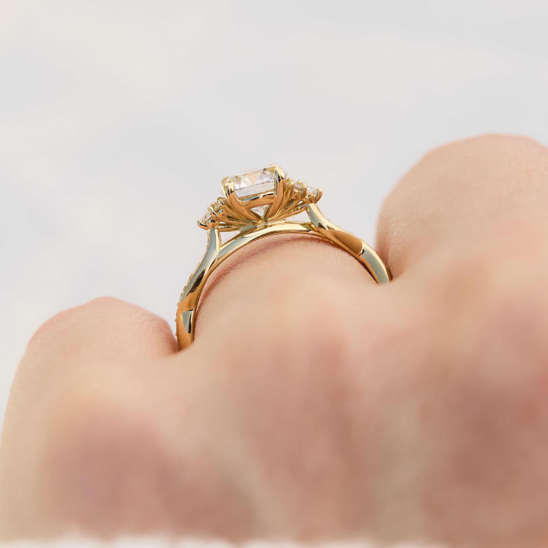 round diamond one of a kind engagement ring set in 18ct yellow gold