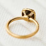 salt and pepper halo engagement ring in yellow gold