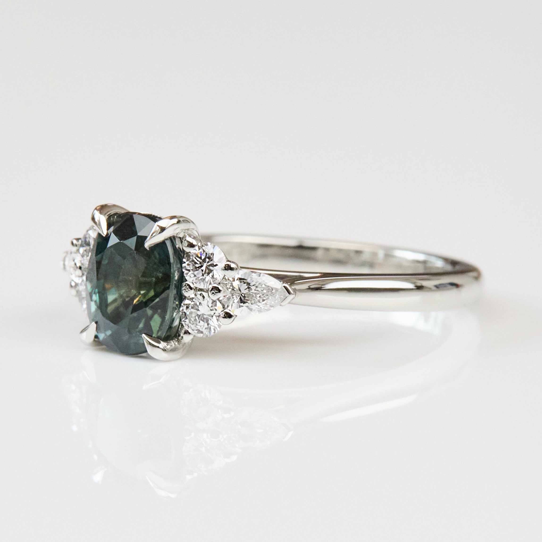 Teal Sapphire Engagement Ring, Iris Setting
