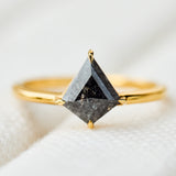 kite shape dark salt and pepper diamond solitaire engagement ring in yellow gold