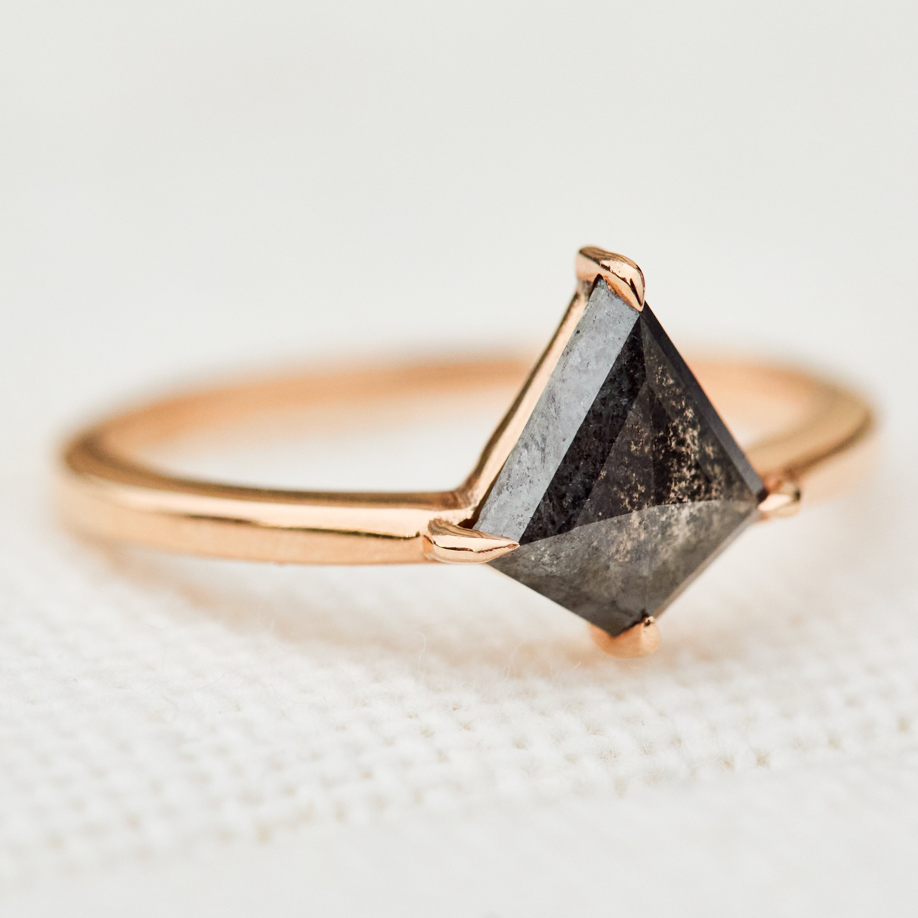 kite shape salt and pepper diamond solitaire engagement ring