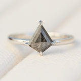 kite shape salt and pepper solitaire engagement ring in platinum