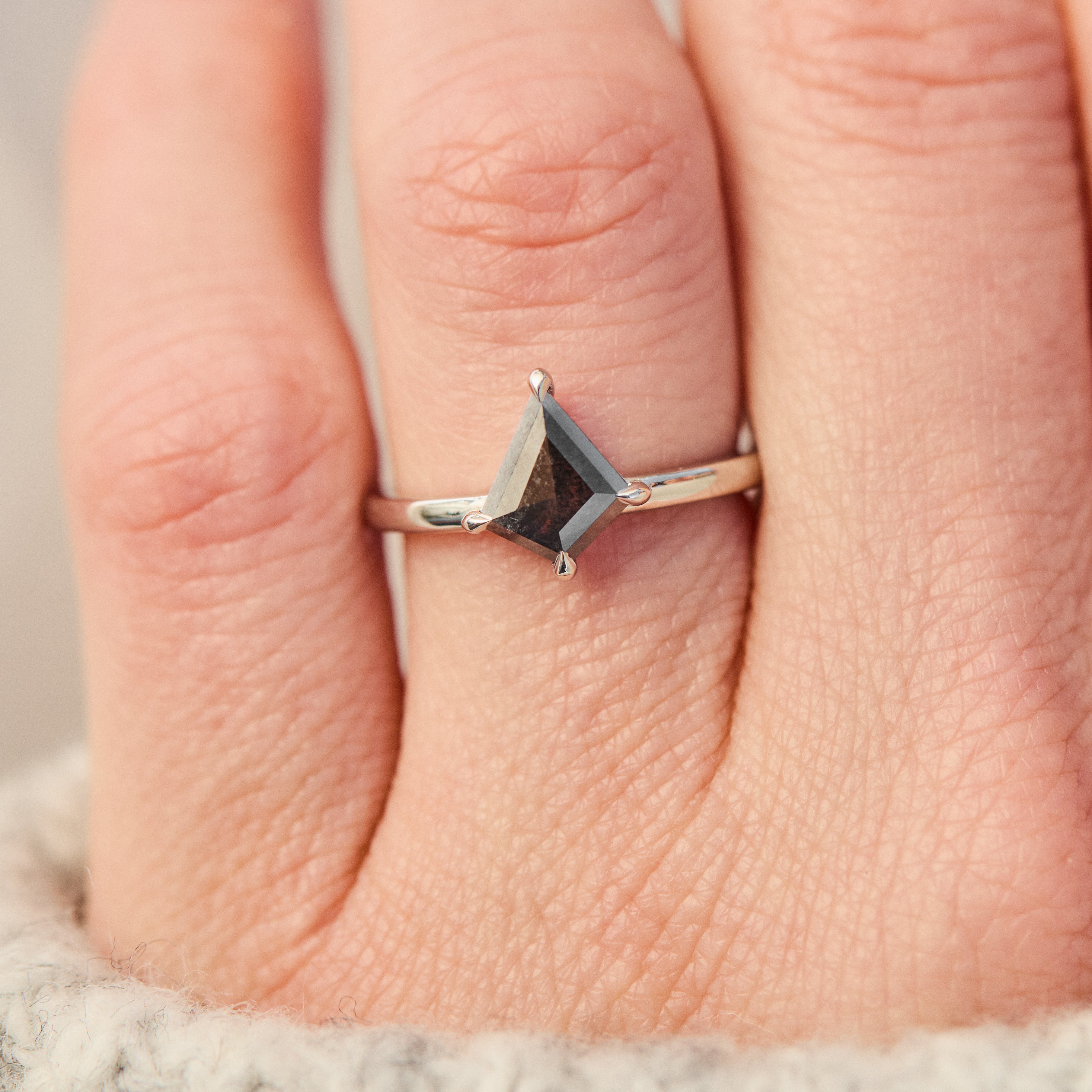 kite shape salt and pepper solitaire engagement ring in platinum