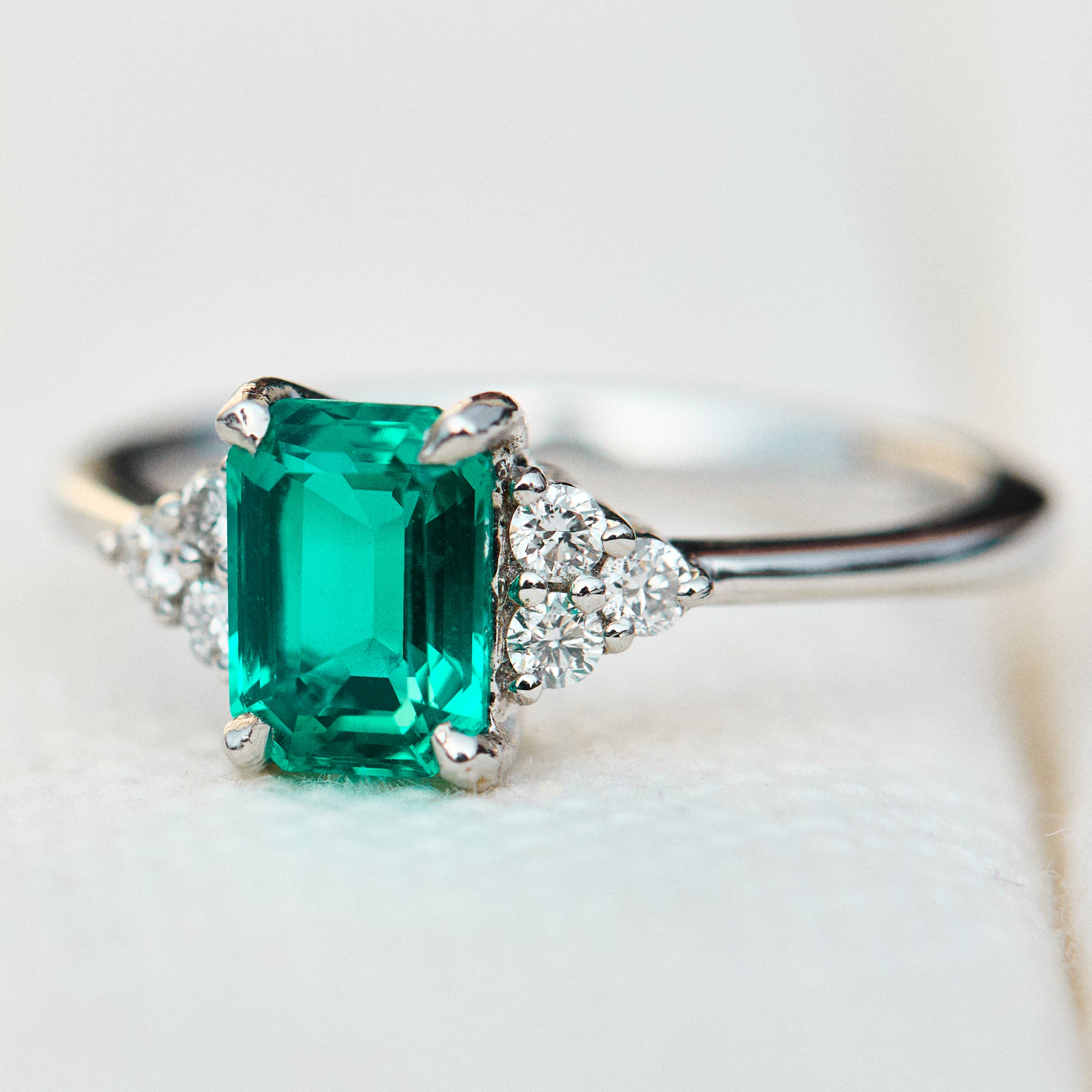 lab grown emerald platinum engagement ring