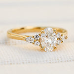 oval lab grown diamond engagement ring set in 18ct yellow gold