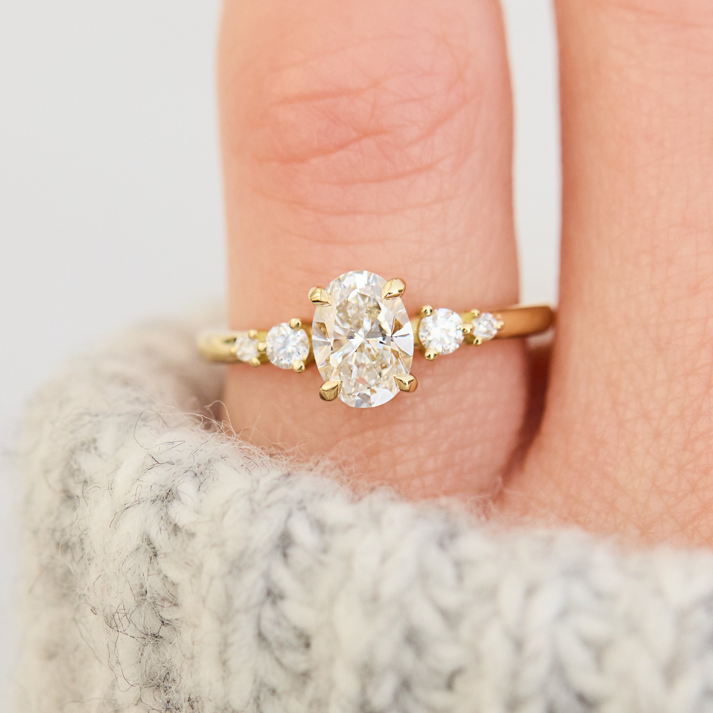 oval lab grown diamond yellow gold engagement ring uk