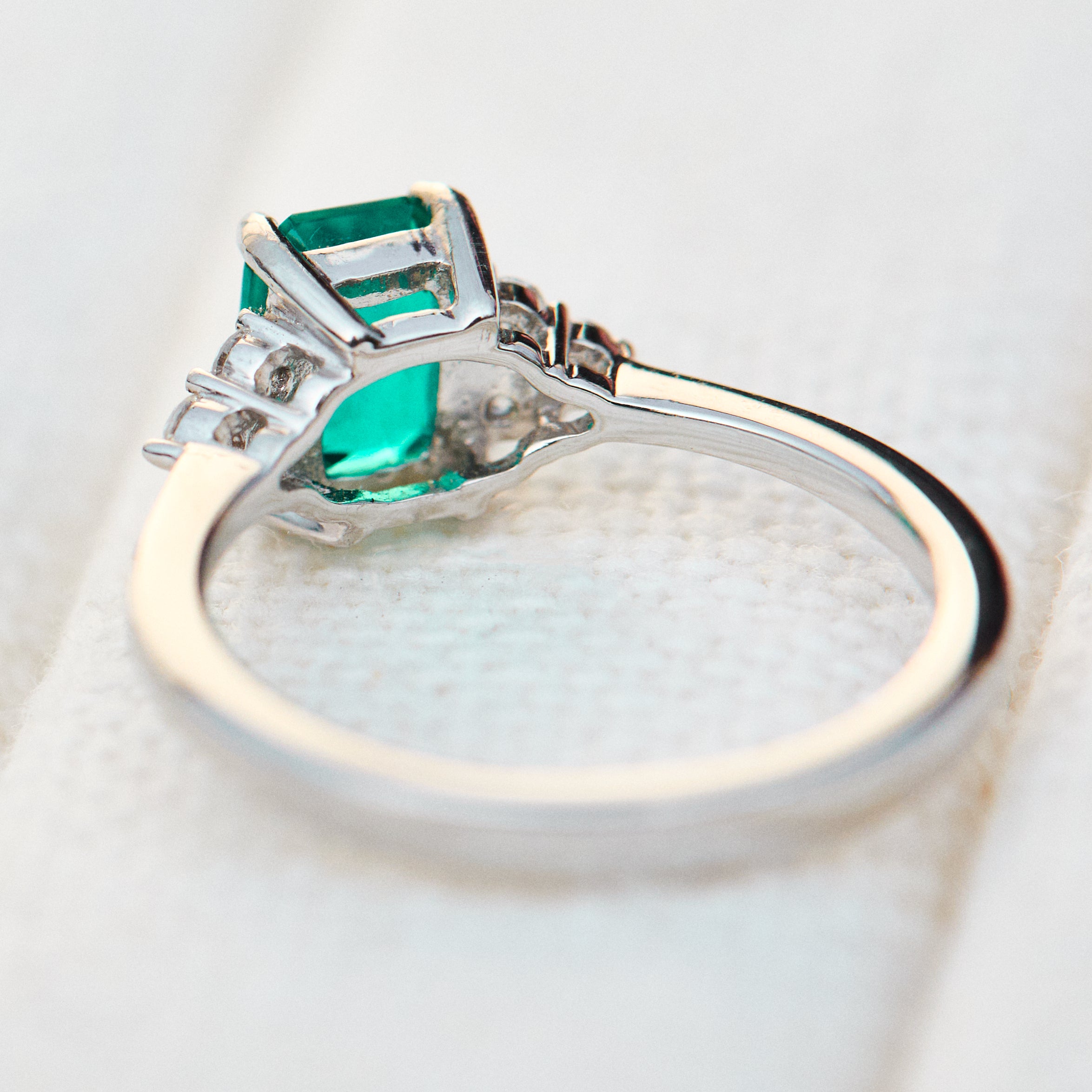 lab grown emerald platinum engagement ring