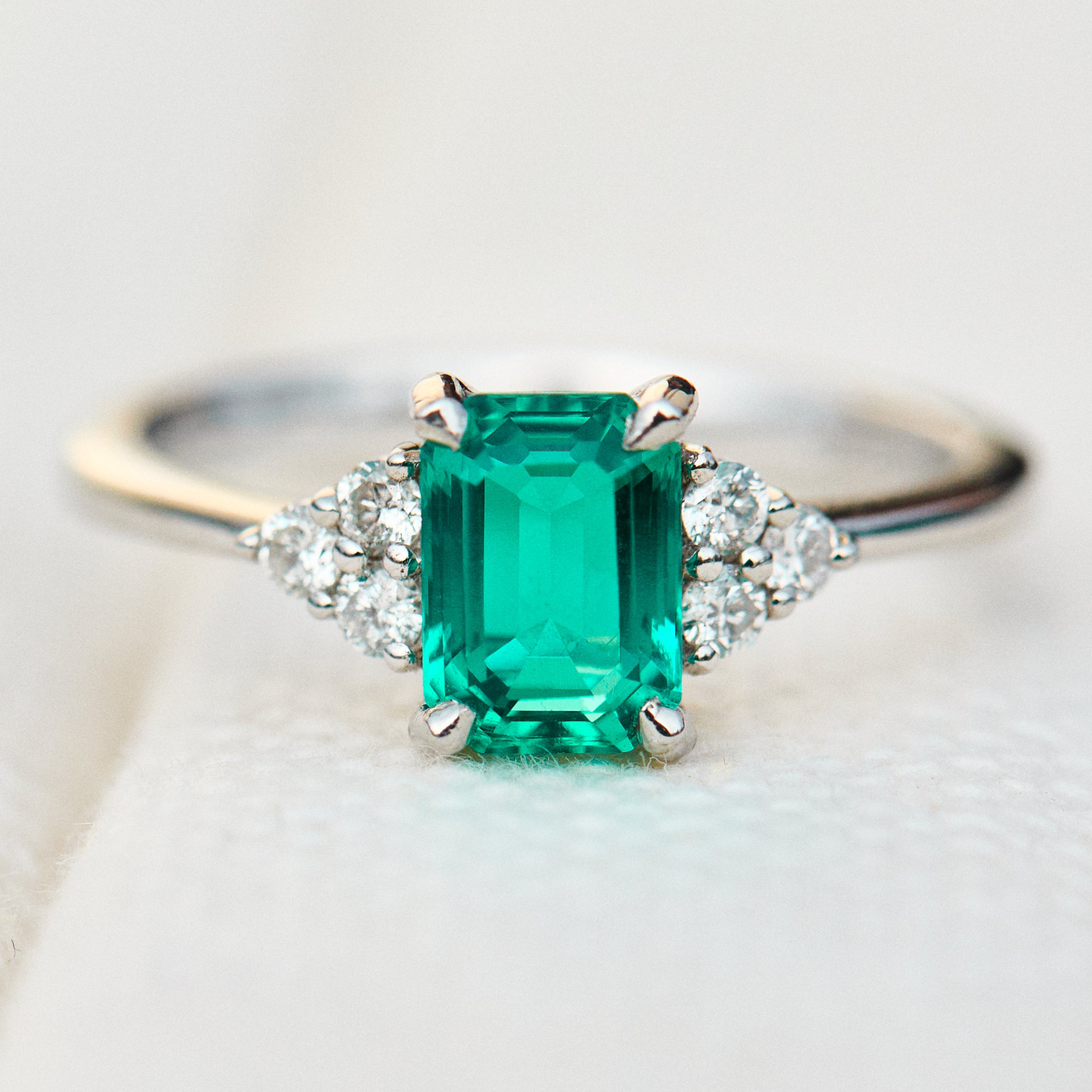 lab grown emerald platinum engagement ring