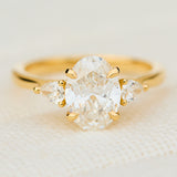 lab grown oval diamond yellow gold engagement ring