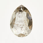 One-of-a-kind pear-shaped rose-cut salt and pepper diamond with unique inclusions.