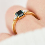18ct yellow gold emerald cut trilogy ​teal sapphire rings