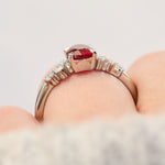 oval lab grown ruby engagement ring in platinum