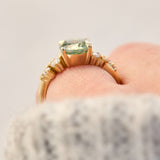 oval mint green sapphire yellow gold engagement ring