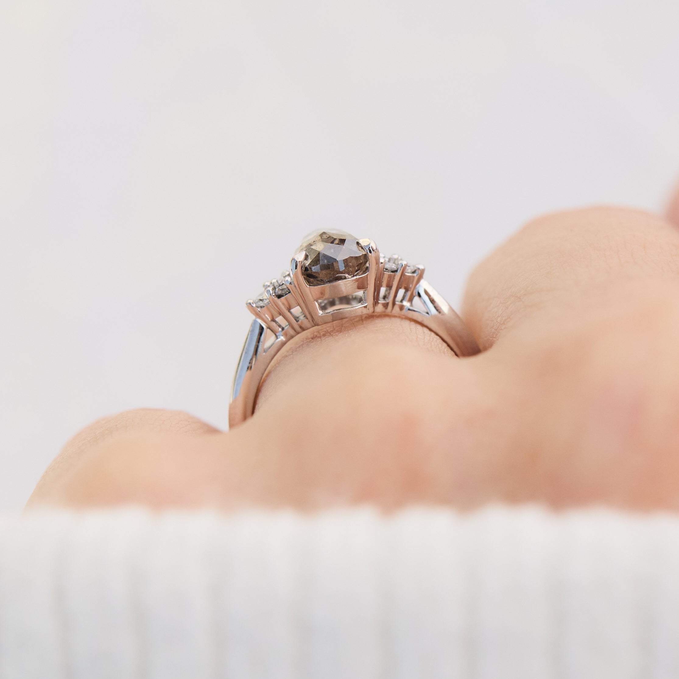 pear shape salt and pepper diamond engagement ring in platinum