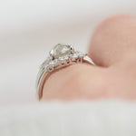 platinum pear shape rose cut salt and pepper diamond trilogy engagement ring