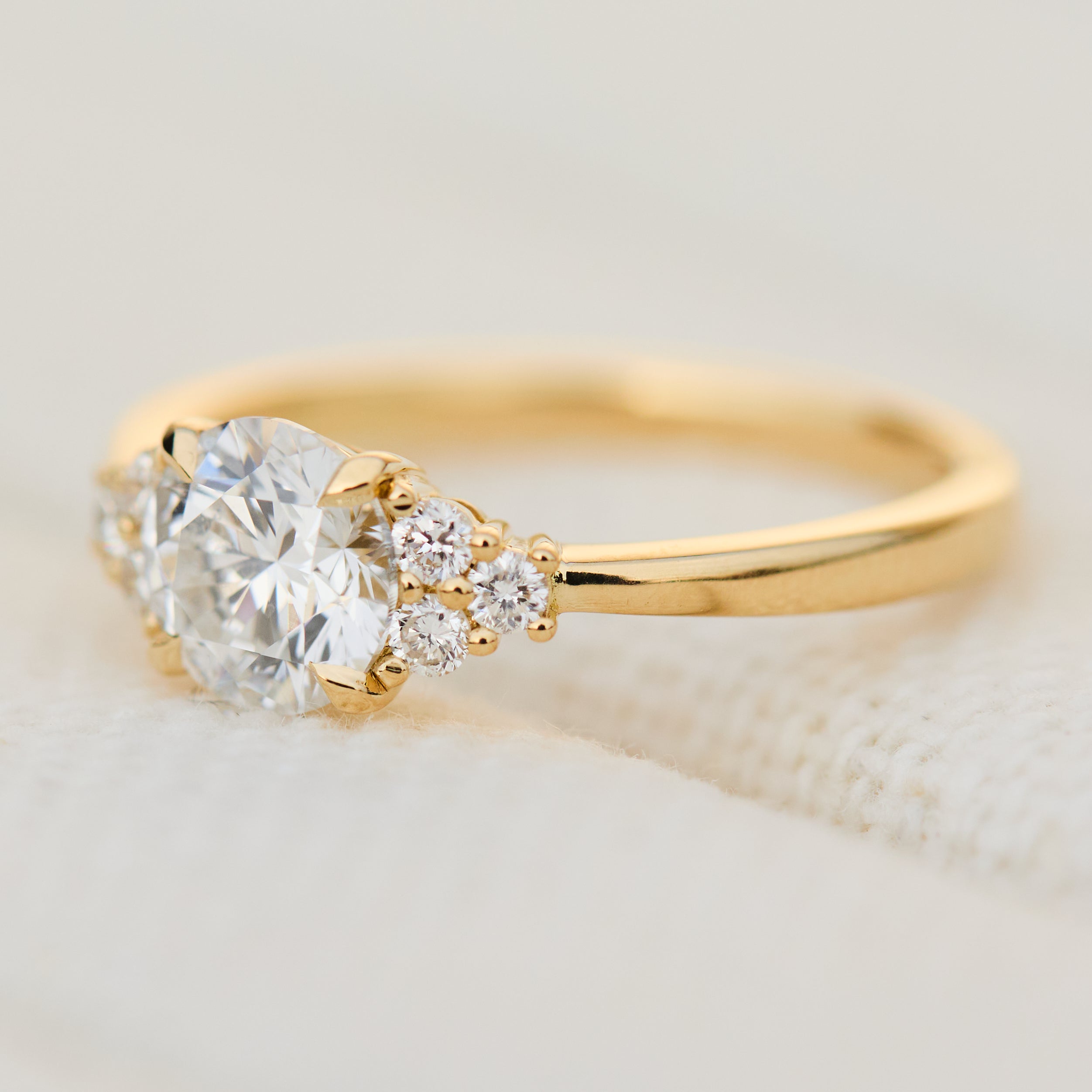 round lab grown diamond yellow gold engagement ring