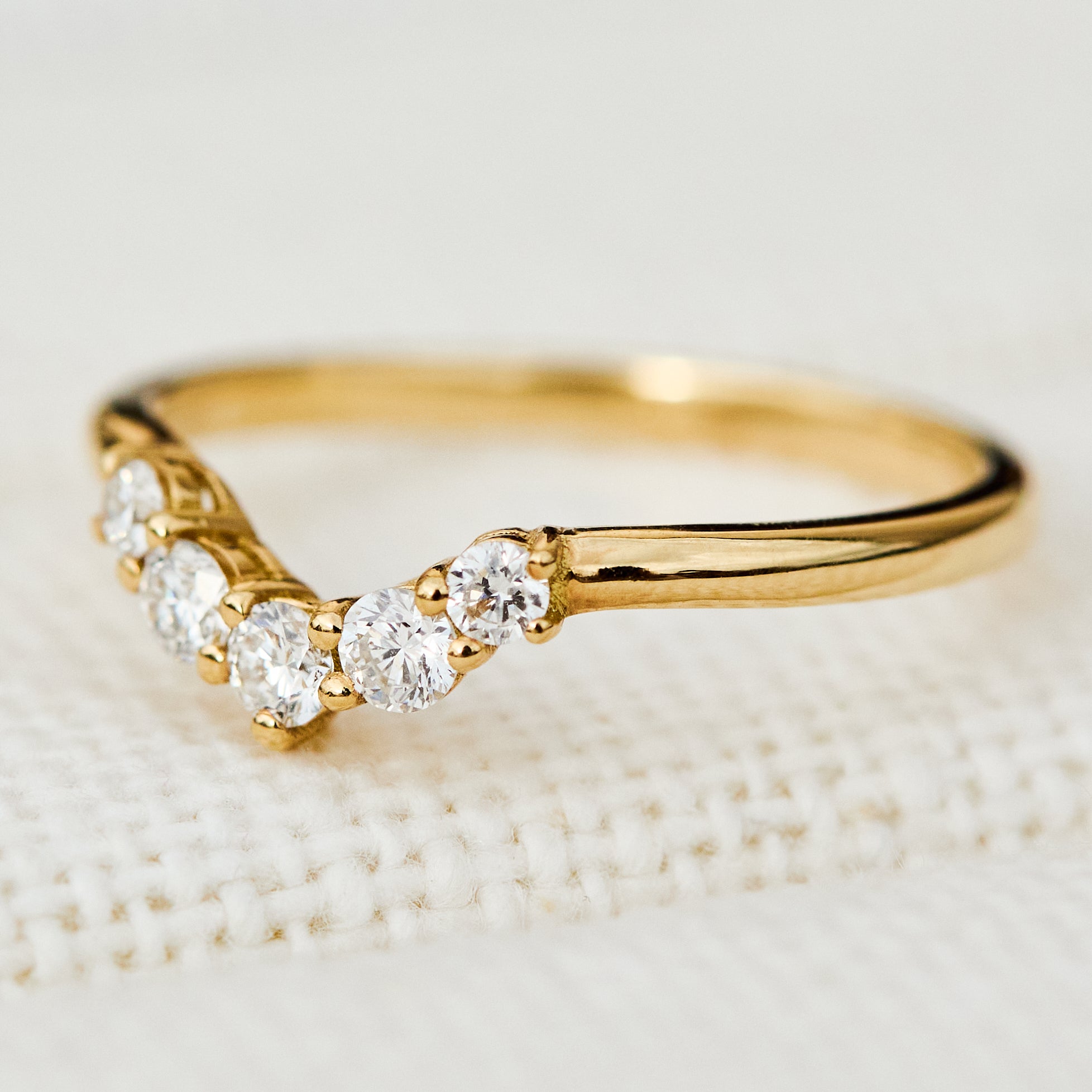 mia diamond wedding band with five round diamonds