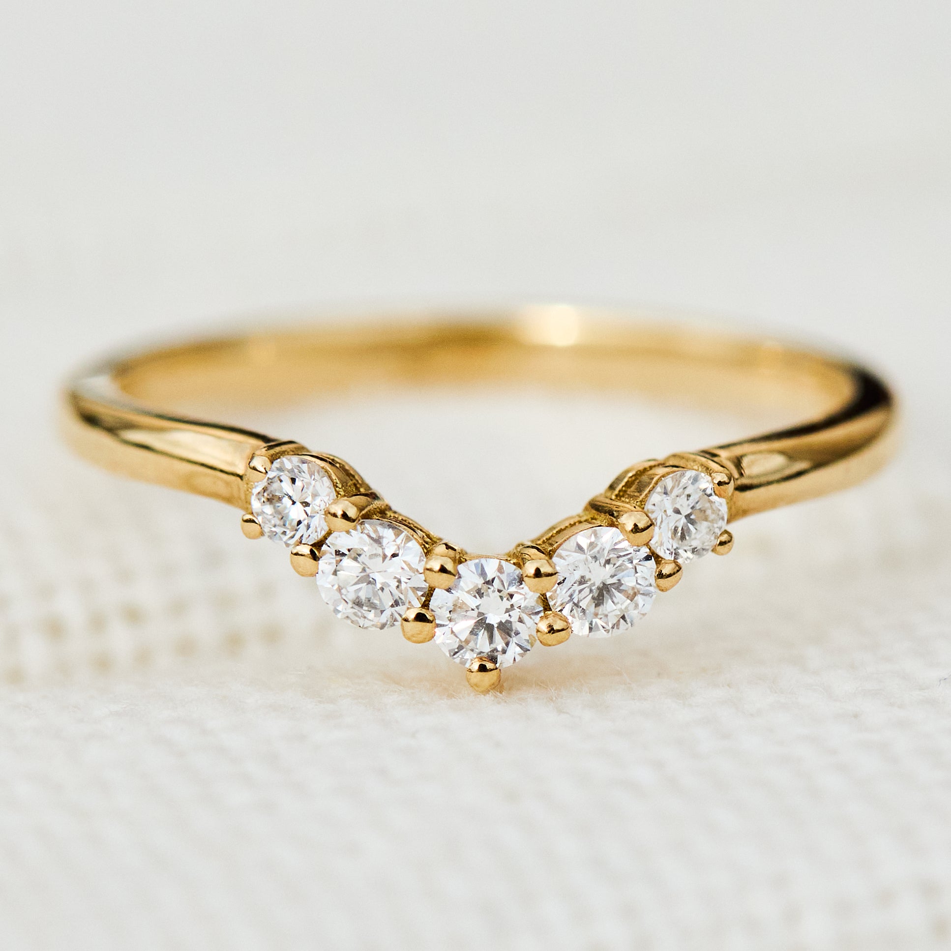 mia diamond wedding band with five round diamonds