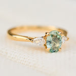 montana oval sapphire trilogy yellow gold engagement ring