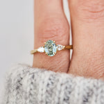 montana oval sapphire trilogy yellow gold engagement ring