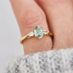 montana oval sapphire trilogy yellow gold engagement ring