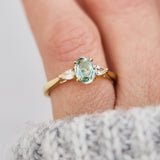 montana oval sapphire trilogy yellow gold engagement ring