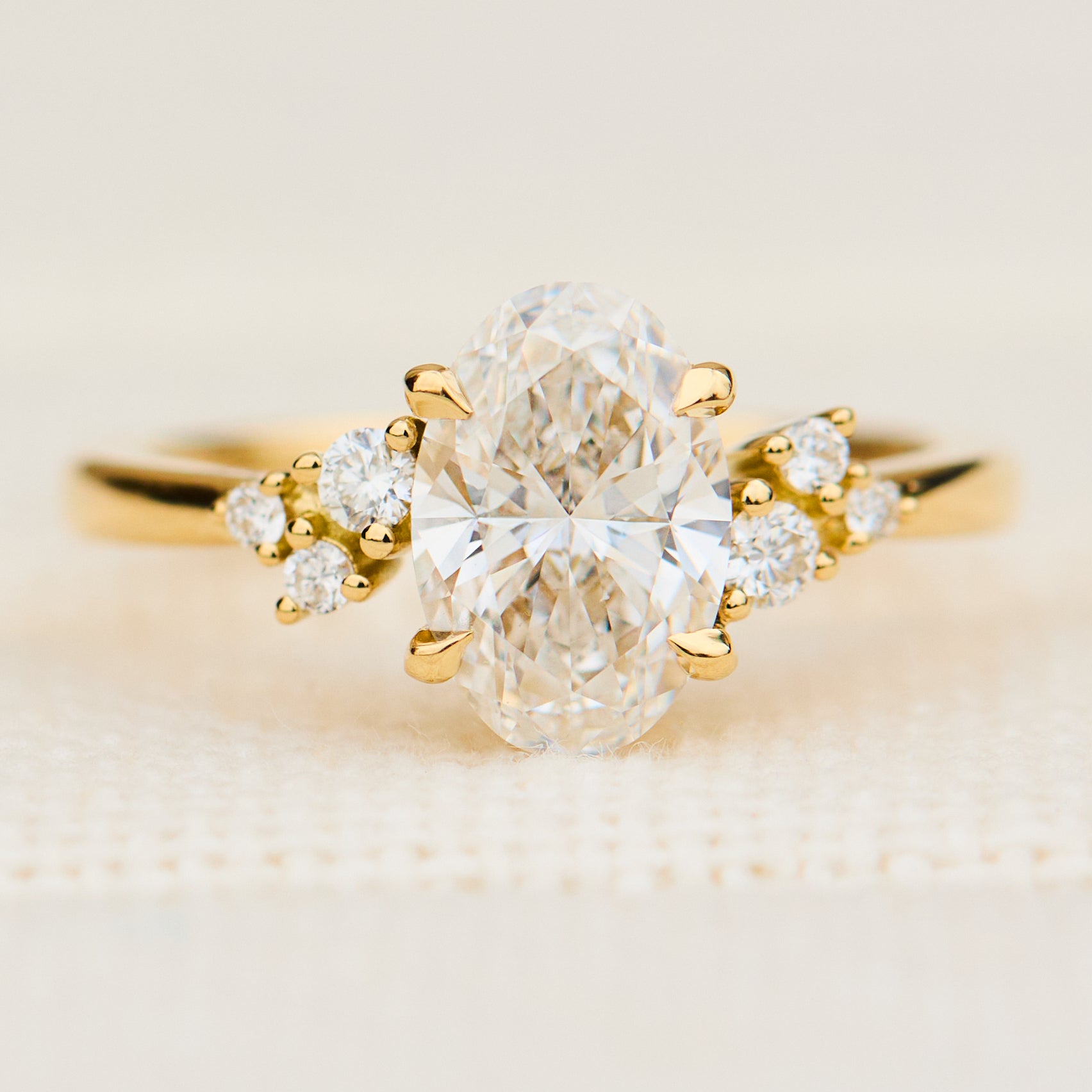 one of a kind oval lab grown diamond engagement ring in yellow gold