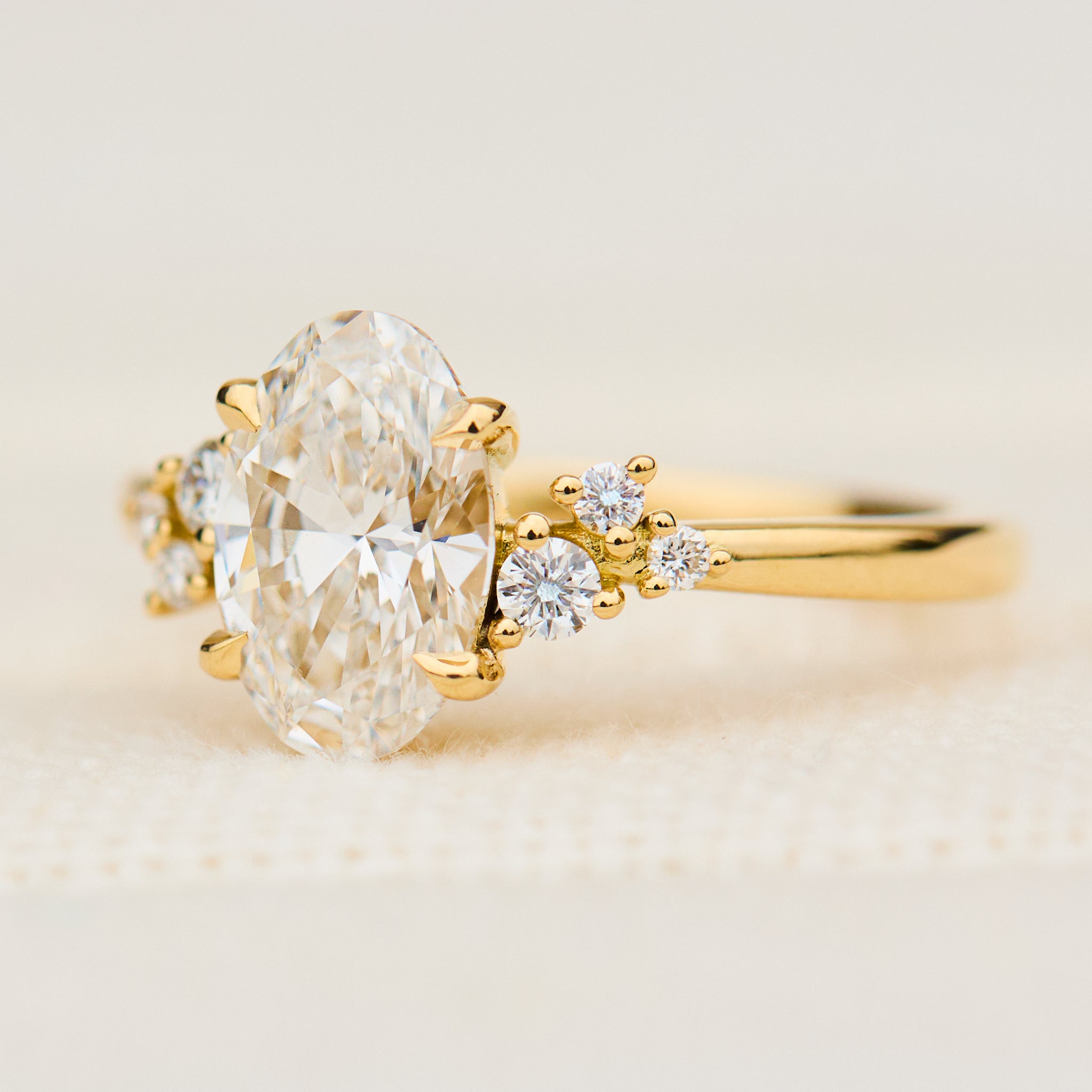 one of a kind oval lab grown diamond engagement ring in yellow gold