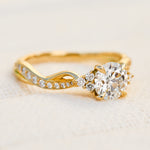 round diamond one of a kind engagement ring set in 18ct yellow gold