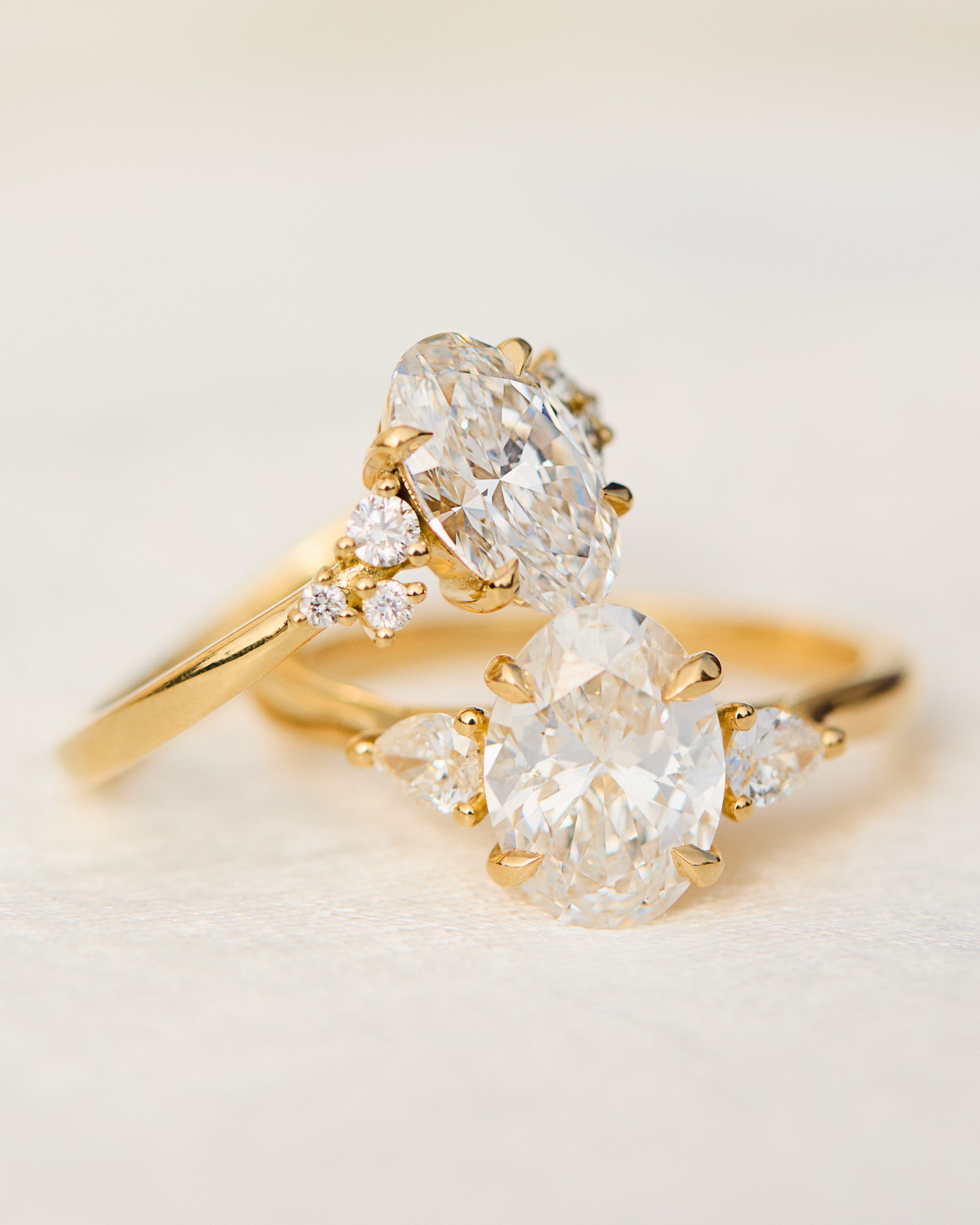 oval diamond engagement rings in yellow gold