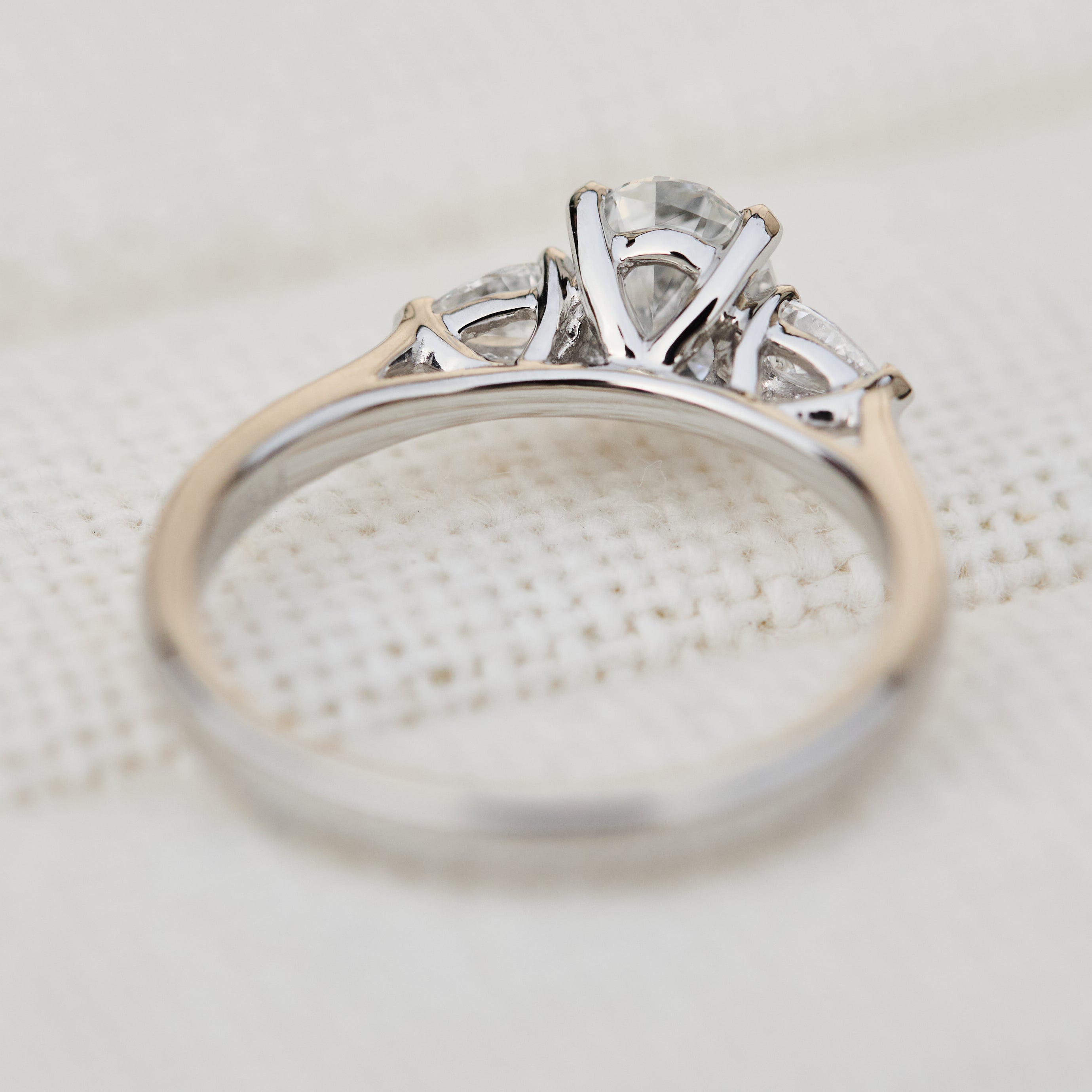 oval lab grown diamond trilogy engagement ring in platinum