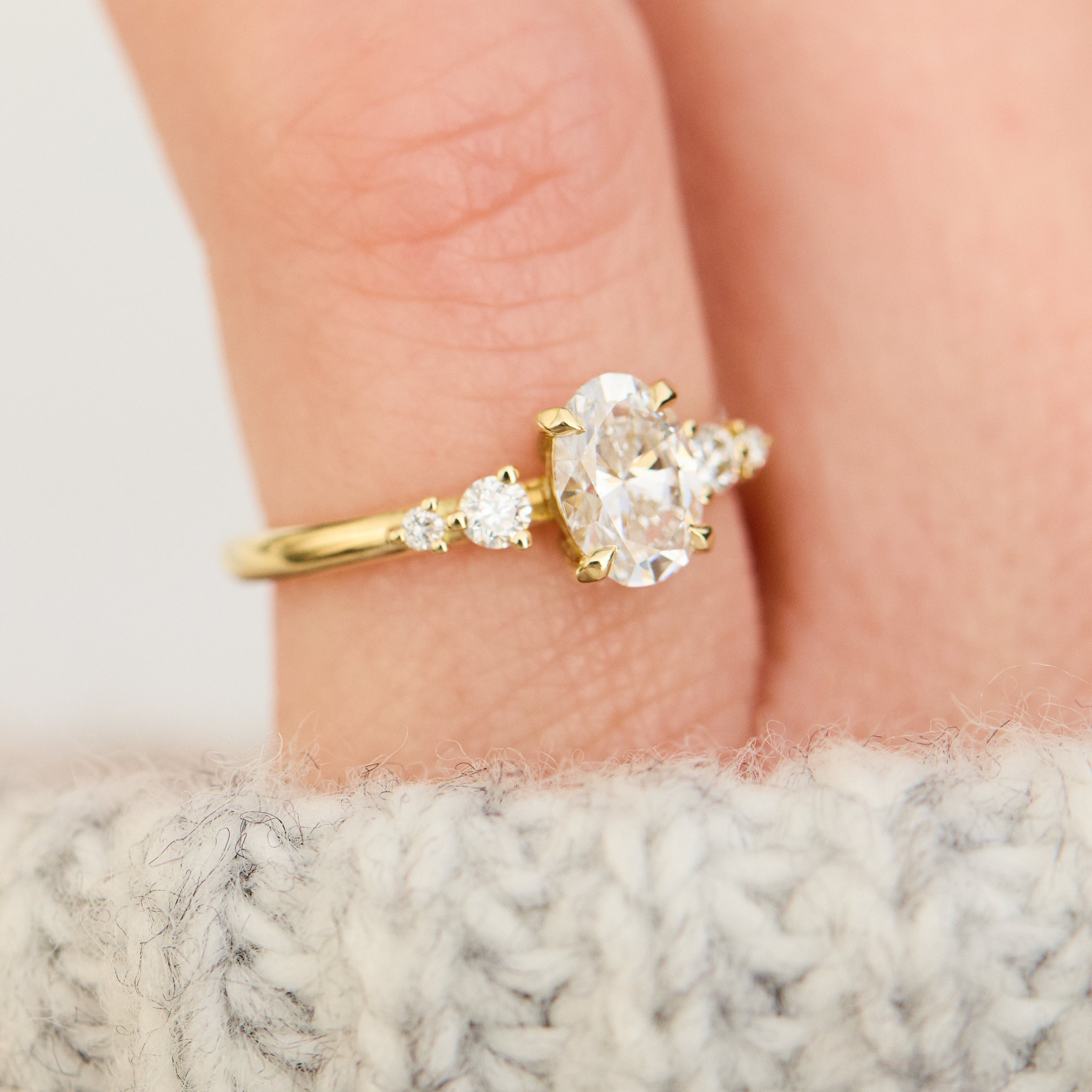 oval lab grown diamond yellow gold engagement ring uk