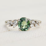 oval green sapphire platinum engagement ring