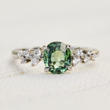 oval green sapphire platinum engagement ring