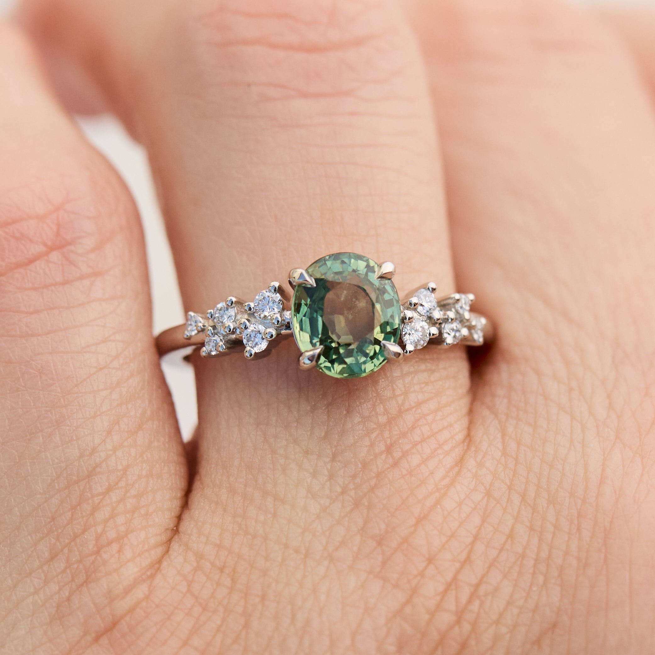 oval green sapphire platinum engagement ring