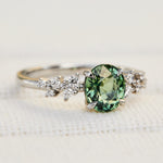 oval green sapphire platinum engagement ring