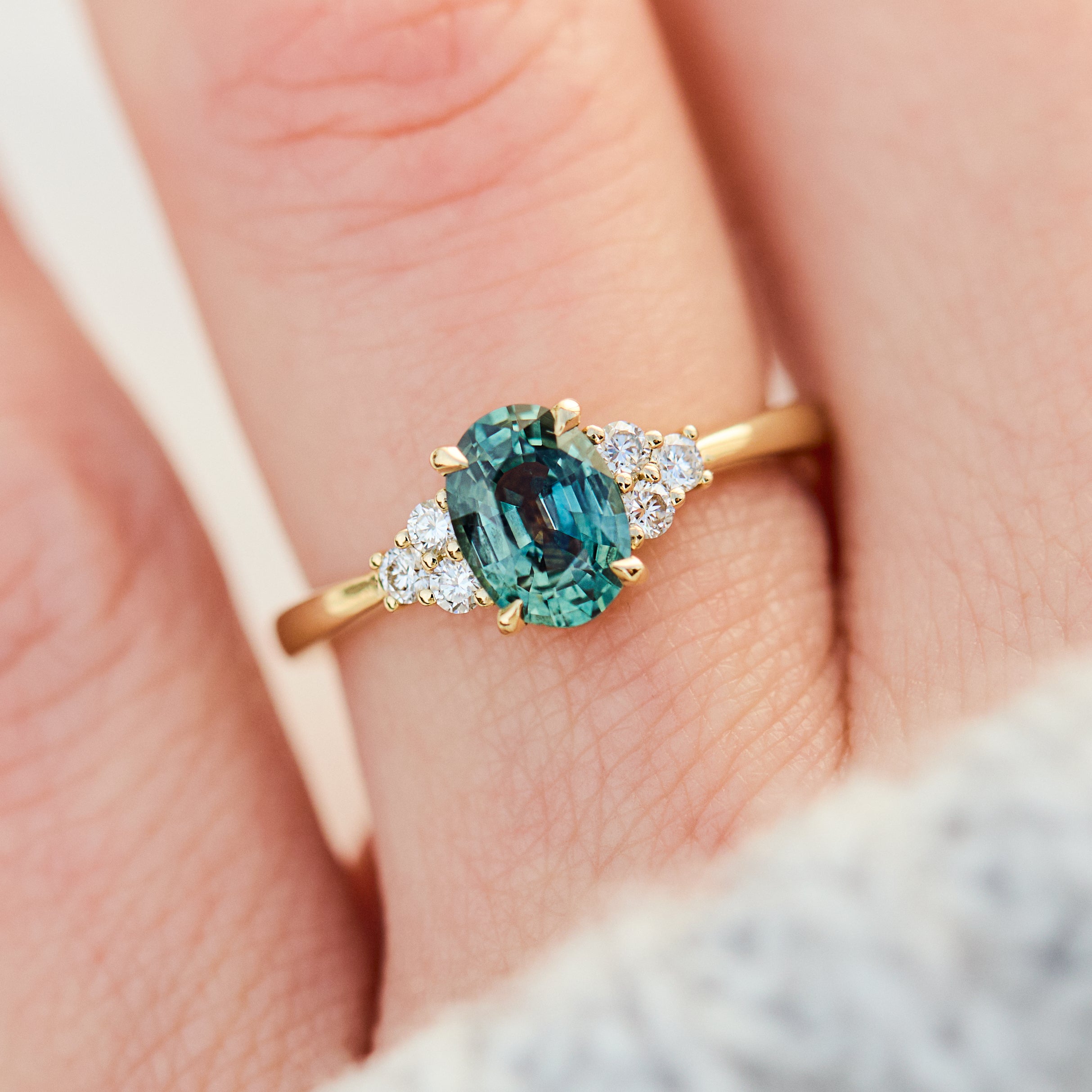 oval green teal sapphire ring