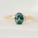 oval green teal sapphire ring